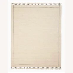 West Elm Tassel Trim Jute Rug -Othe Furniture Shop 1500 1500 frame 0 4849