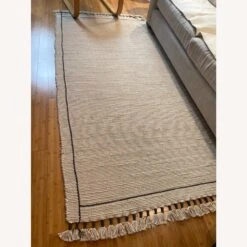 West Elm Tassel Trim Jute Rug -Othe Furniture Shop 1500 1500 frame 0 4850